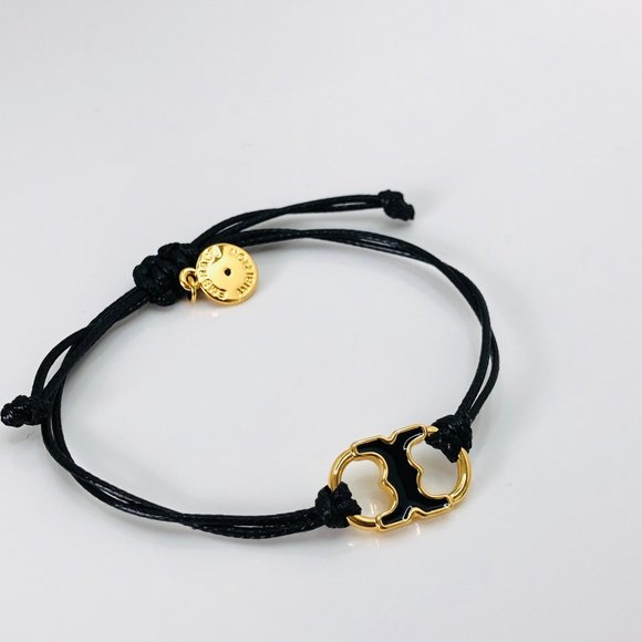 Tory Burch Jewelry - TORY BURCH BLACK FILL EMBRACE AMBITION